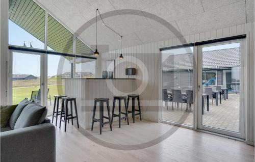 Kongsmark House | Elegant 9 Bedroom Retreat with Pool in Rømø