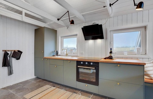 Fjand Badeby House | Cozy Cottage with Oceanfront Views and Modern Design