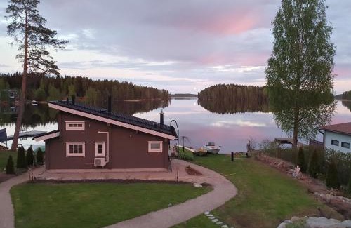 Kuopio House | Inviting Log Cabin Retreat on Kallavesi with Hot Tub