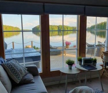 Kuopio House | Inviting Log Cabin Retreat on Kallavesi with Hot Tub