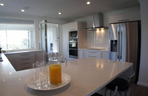Matarangi House | Modern Harbourfront Beach House with Ocean Views & Breakfast
