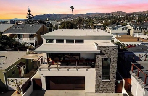 Pierpont Bay House | Coastal Retreat with Pool and Spa Steps from the Beach