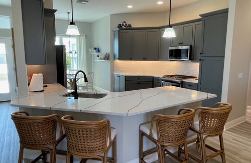 Sumter County House | Stunning new home with water view, screened lanai & golf cart!