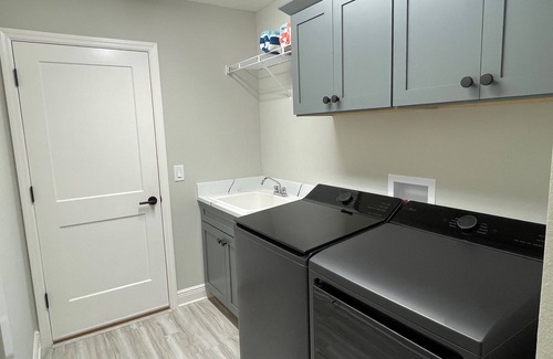 Sumter County House | Stunning new home with water view, screened lanai & golf cart!