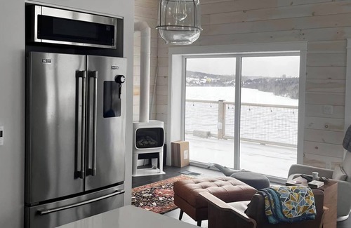 Grand-Etang House | Beautiful Nordic Cottage on Lake with Ocean Views & Breakfast