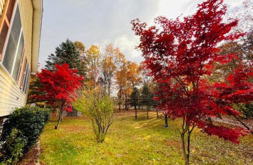 East Stroudsburg Villa | Elegant Poconos Villa with Hot Tub, Pool, and Game Room
