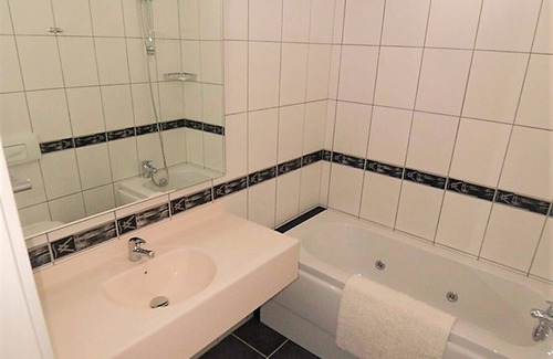 Side House | Inviting 2-Bedroom Home with Pool in Prime Location