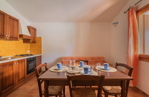 Tanaunella Apartment | Inviting Residence Bouganvillage: Family-Friendly Retreat