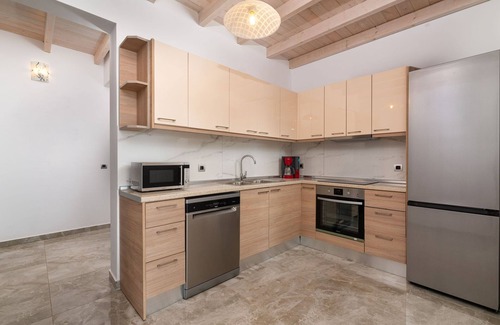 Prassonissi Villa | Experience Villa Stone: Sea Views & Private Balcony Awaits