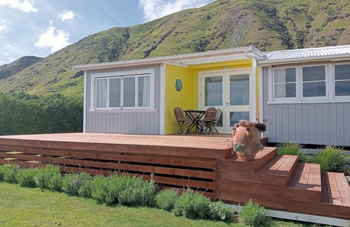 Ngawi House | Ocean View Kiwi Bach: Family Escape with Top Reviews!