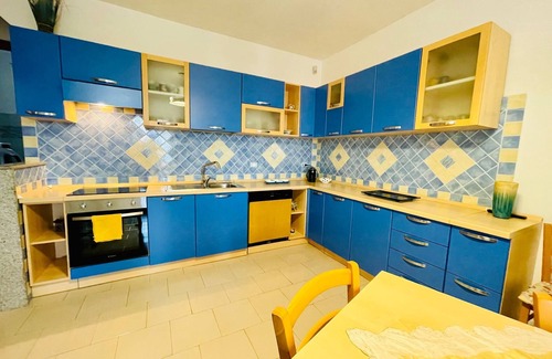 La Muddizza Apartment | Sea View Haven: Private Terrace, Spa & Family Amenities