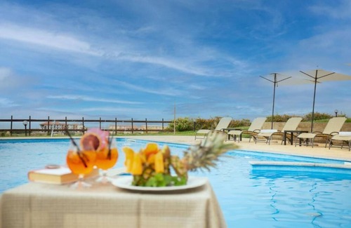 La Muddizza Apartment | Sea View Haven: Private Terrace, Spa & Family Amenities