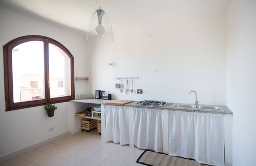 Portoscuso Apartment | Oceanfront Attic with Breathtaking Views & Top Ratings