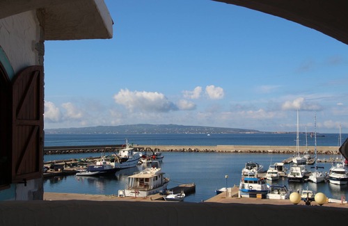 Portoscuso Apartment | Oceanfront Attic with Breathtaking Views & Top Ratings