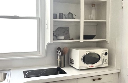 Hughesville Apartment | Elegant 1 BR Apartment with Ocean View in DT Hughesville