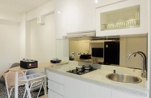Jatinegara Apartment | Modern 2BR Bassura City Apartment with Pool Access