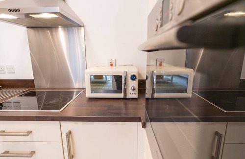 Century Wharf Apartment | Stylish Bay Apartment with Parking and Family-Friendly Amenities