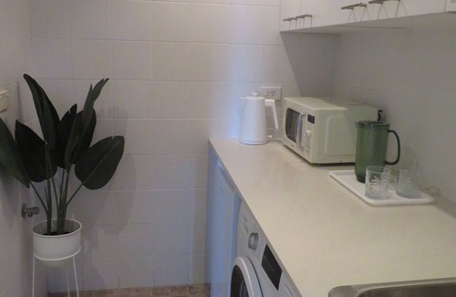 Seaforth Apartment | Beautiful Garden Patio Apartment with Top Guest Ratings