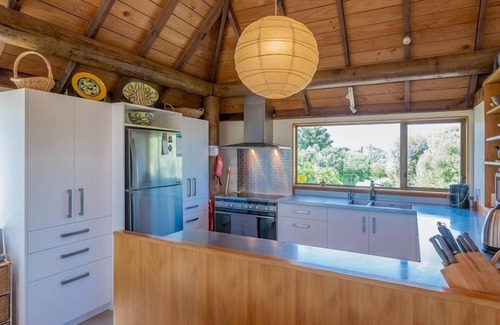 Te Horo Beach House | Beachfront Retreat with Ocean Views and Pool Amenities