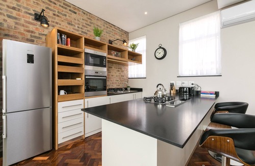 Downtown Johannesburg Apartment | Modern City Center Penthouse with Rooftop Hot Tub