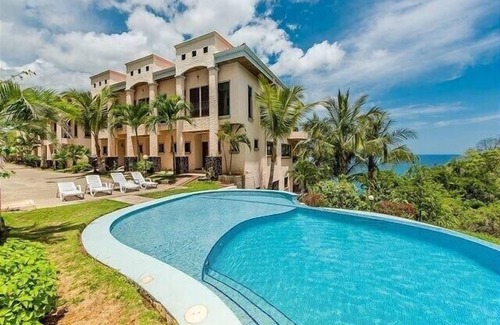 Playa Flamingo Condo | Ocean View Retreat at Tropical Cove Oasis - Top Guest Rated!