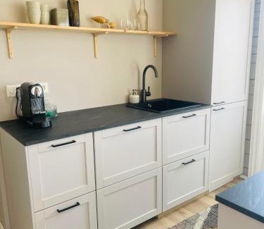 Borgarnes Apartment | Stylish Cottage Retreat with Inviting Hot Tub Experience