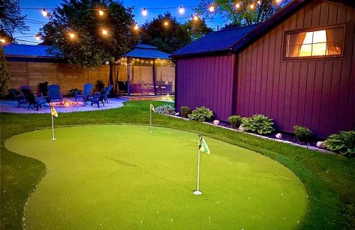 Kingsville House | Modern Kingsville Retreat with Putting Green & Firepit