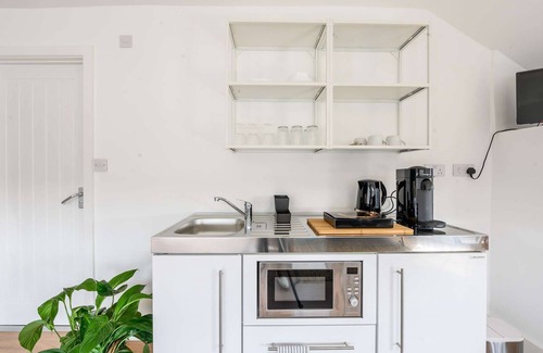 Riverside Apartment | Stylish Boutique Apartment Near City Center for Families