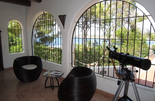 Sant Josep de sa Talaia Villa | Elegant Villa with Ocean Views, Pool & Private Gardens