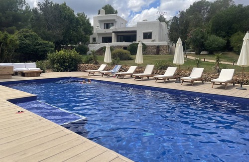 Santa Eulalia del Rio Villa | Stylish Villa with Private Pool & Tennis Court Near Beach