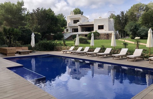 Santa Eulalia del Rio Villa | Stylish Villa with Private Pool & Tennis Court Near Beach