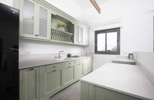 Nahariya Apartment | Modern Garden Retreat Steps from Akhziv Beach