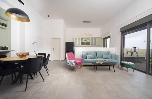 Nahariya Apartment | Modern Garden Retreat Steps from Akhziv Beach