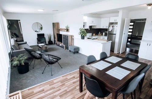 Singleton House | Stylish Retreat with Entertainment Area and Pet-Friendly Amenities