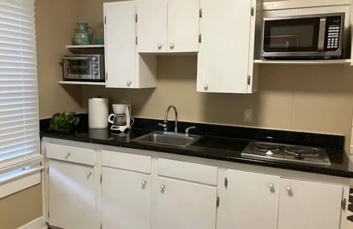 Freetown - Port Rico Apartment | Inviting City Unit with Breakfast and Family-Friendly Amenities