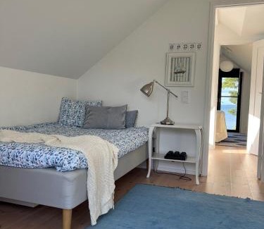 Vadstena Villa | Elegant Lake View House with Hot Tub & Family-Friendly Perks