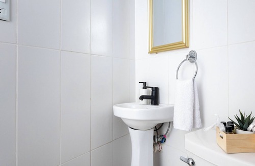 Samana Hotel | Stylish City Loft with Hot Tub and Wi-Fi Access