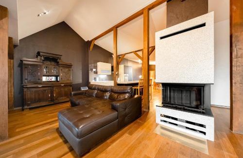Centrs Apartment | Stylish Mansard in Riga's Vibrant Center - Rated 9.5/10