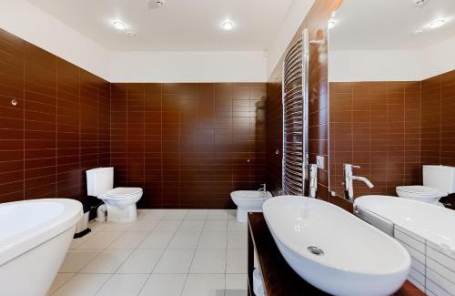 Centrs Apartment | Stylish Mansard in Riga's Vibrant Center - Rated 9.5/10