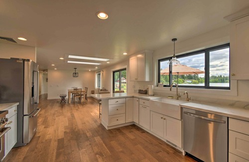 East Olympia House | Elegant Olympia Home with Private Boat Dock & Spa Access