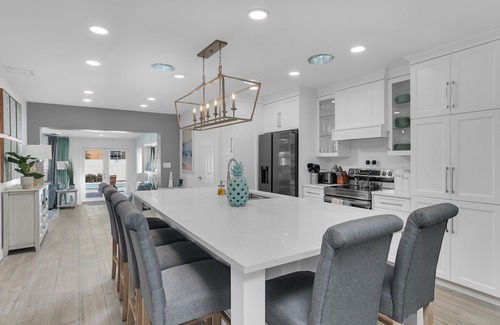 Melaleuca Gardens House | Beautifully Remodeled 4 BR with Heated Pool Near FLL