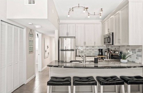 Orlando Beach Condo | Stylish Riverfront Villa W/Private beach access, Fire Pit, & BBQ Grills
