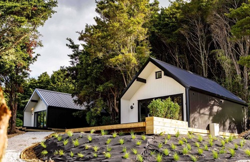 Mangawhai Villa | Stylish Space with a Green Rural outlook peaking to the Mangawhai Sand Dunes and