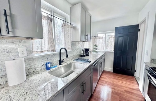 Clinton Township House | Modern Retreat: Game Room, Bar & Breakfast Included