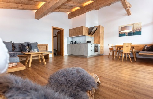 Unken Apartment | Stylish Apartment with Sunny Balcony & Family-Friendly Amenities