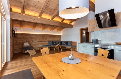 Unken Apartment | Stylish Apartment with Sunny Balcony & Family-Friendly Amenities