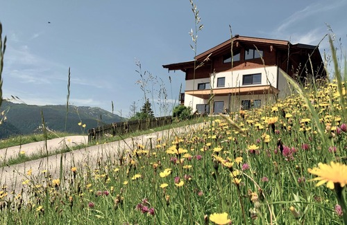 Unken Apartment | Stylish Apartment with Sunny Balcony & Family-Friendly Amenities