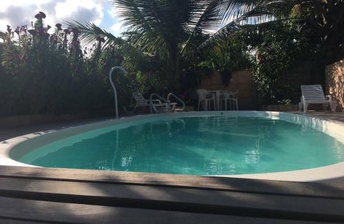 Bairro da Enseada House | Cozy Suite with WiFi, Steps from Caraguatatuba Beach