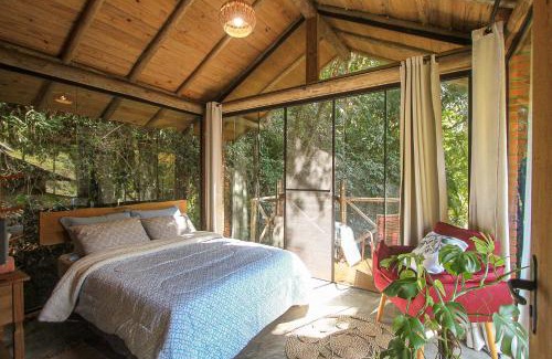 Antonio Carlos Cabin | Relaxing Suite with Waterfall and Oceanfront Amenities