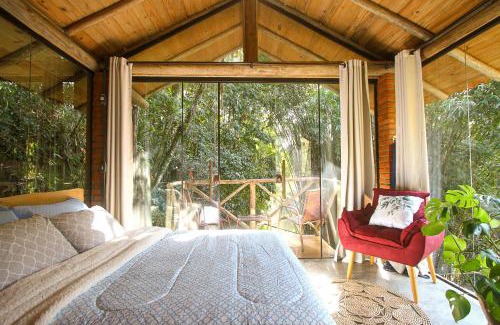 Antonio Carlos Cabin | Relaxing Suite with Waterfall and Oceanfront Amenities